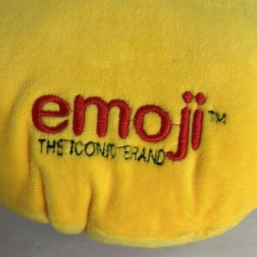 THE ICONIC BRAND EMOJI SMILE PILLOW WITH SUNGLASSES